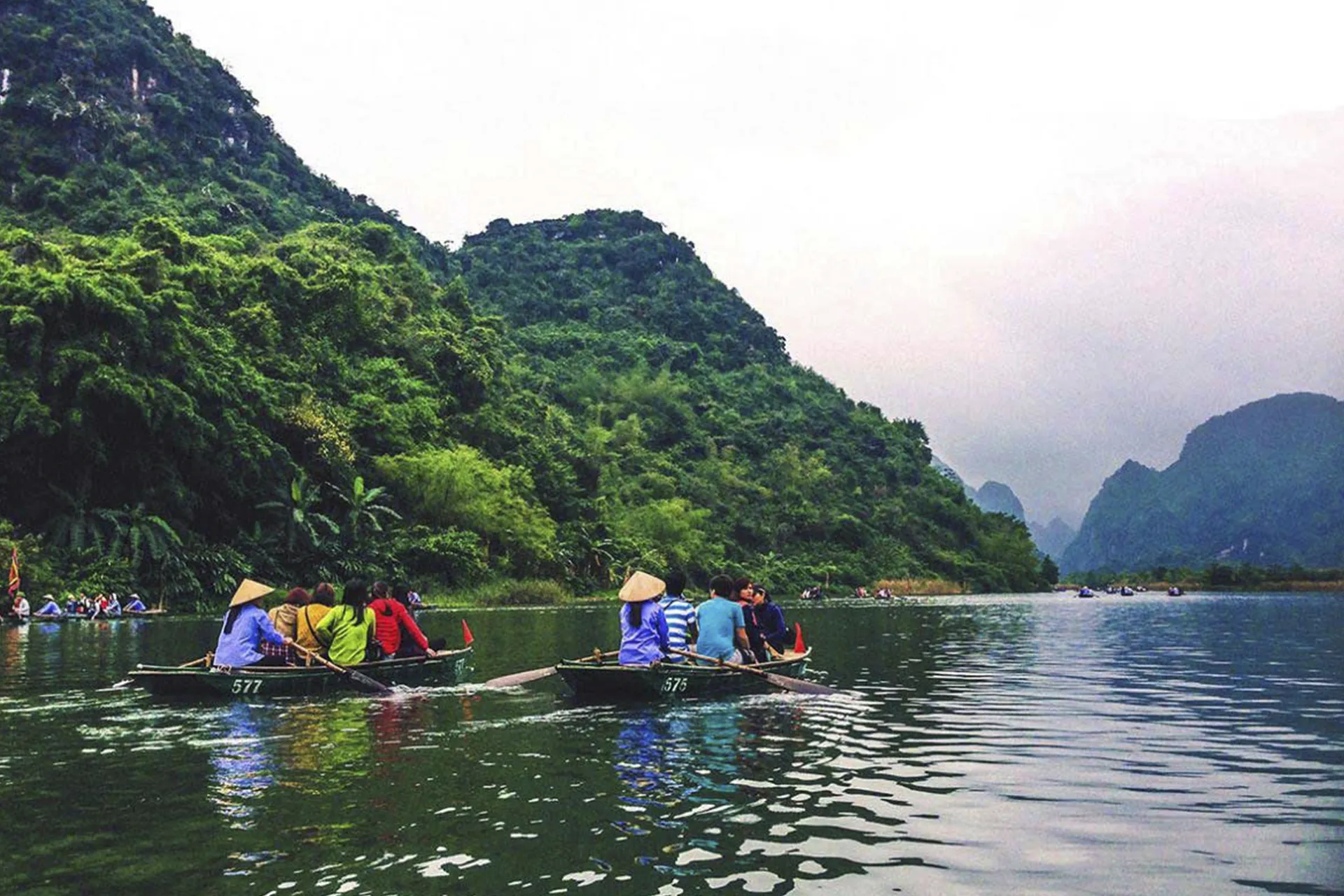 Boats sailing on a river at FiturNext