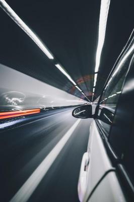 Rear-view mirror of an electric vehicle in a tunnel