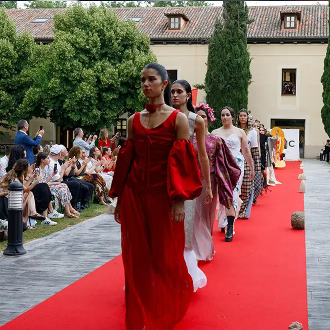 Models parading for the Universidad Rey Juan Carlos Cibelespacio at Mercedes-Benz Fashion Week Madrid