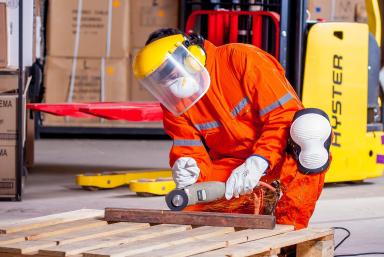 Person working with protection in an industry