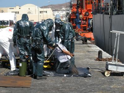 Civil guards wearing PPE during an action against fentanyl.