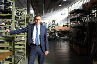 Santiago Rodríguez, manager of DOM MCM in the company's warehouse