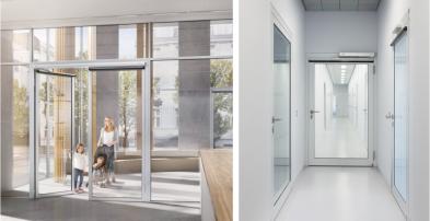 A lady and two girls going through an automatic door.